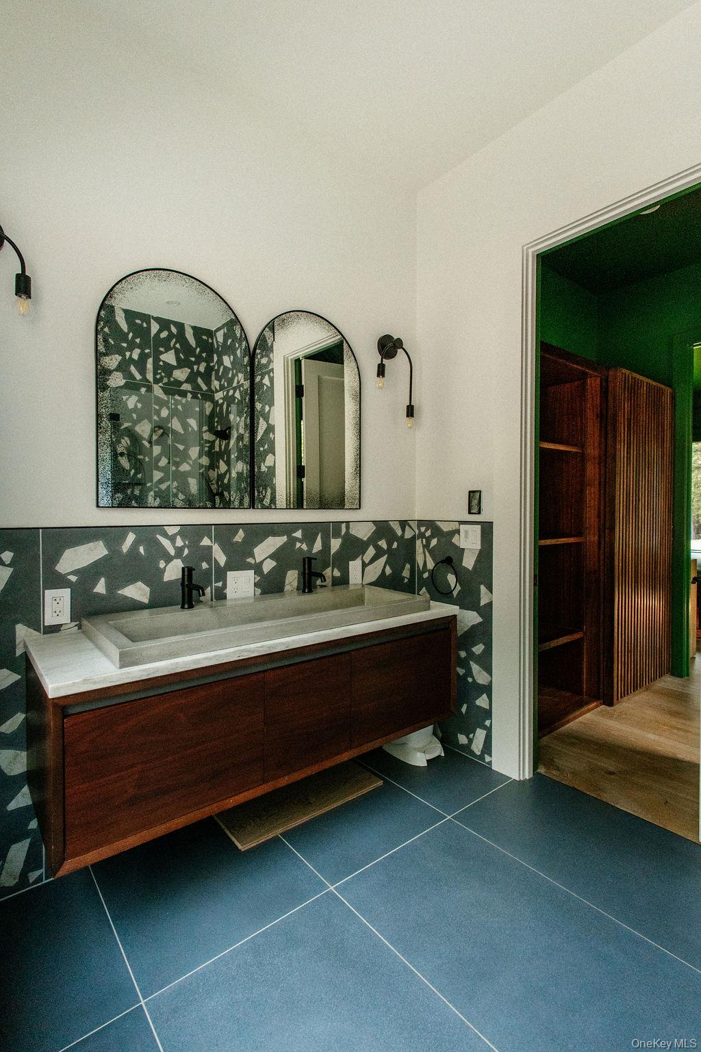 72 Van Tine Road Kerhonkson, NY 12446 - Photo 23 of 39 a bathroom with a sink and a mirror