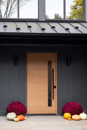 a view of a swimming pool and a yard