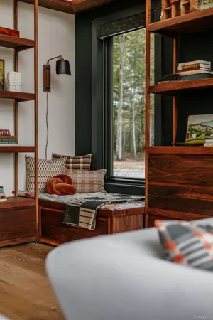 a view of an chair and table in the balcony