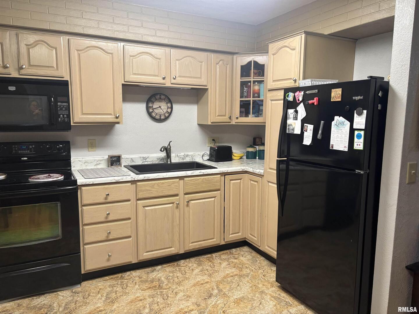 434 Payson Street Kewanee, IL 61443 - Photo 12 of 38 a kitchen with stainless steel appliances granite countertop a refrigerator and a stove top oven