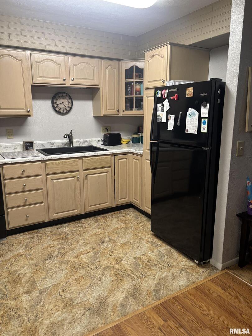 434 Payson Street Kewanee, IL 61443 - Photo 15 of 38 a kitchen with a stove and a refrigerator