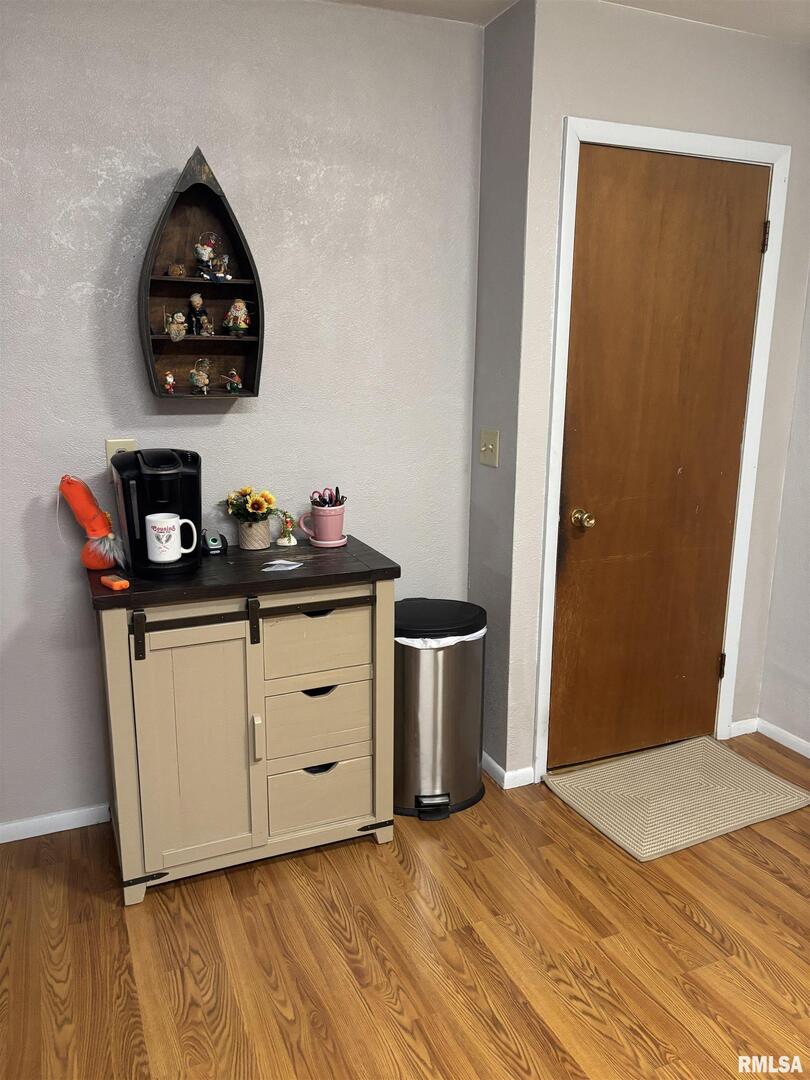 434 Payson Street Kewanee, IL 61443 - Photo 17 of 38 a bedroom with a bed and cabinets