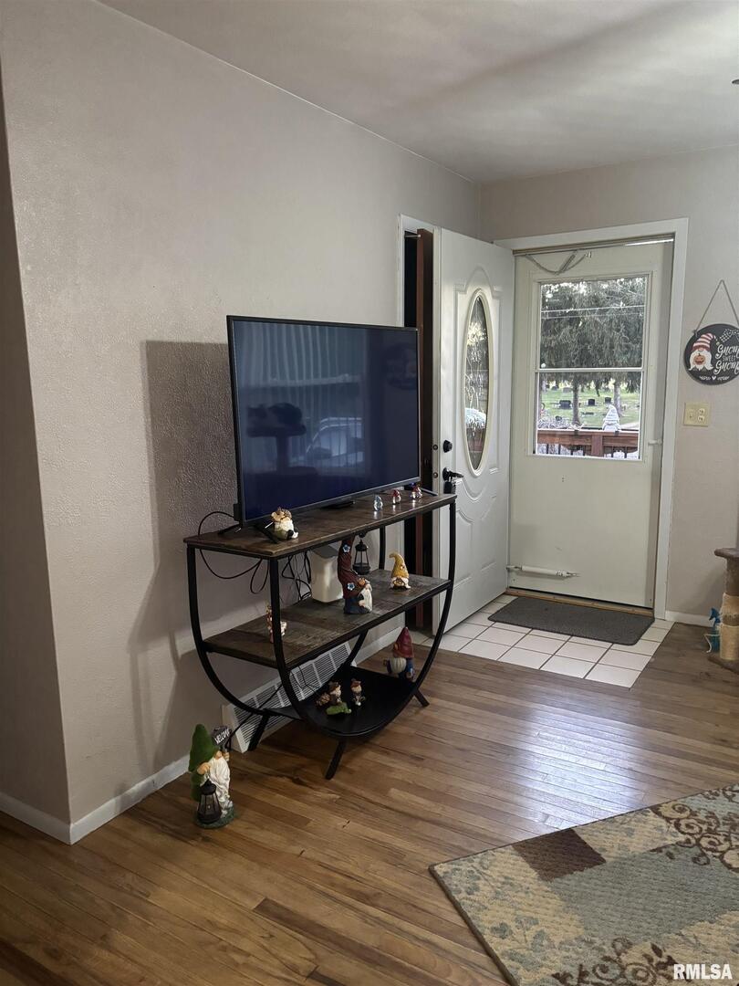 434 Payson Street Kewanee, IL 61443 - Photo 9 of 38 a view of workspace with wooden floor windows