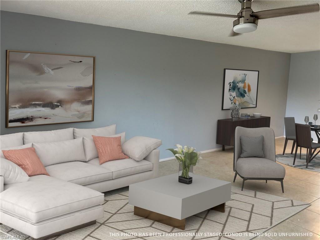 5651 Rattlesnake Hamm Road, Unit C107 Naples, FL 34113 - Photo 6 of 20 SPACIOUS LIVING ROOM AREA