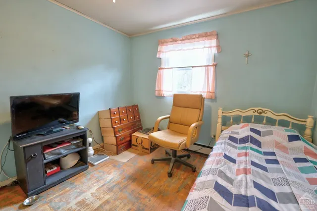 an aerial view of houses with outdoor space