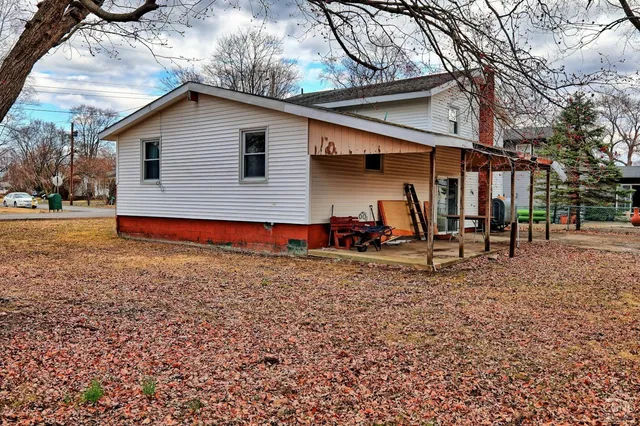 a backyard of a house with lots of green space