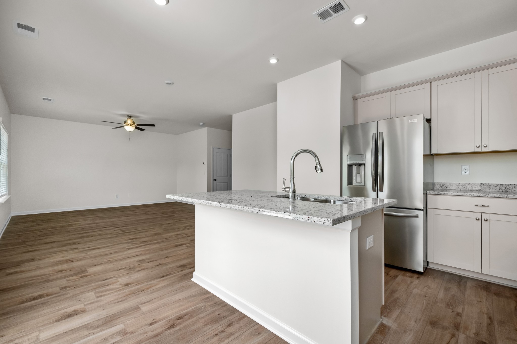 106 Keystone Road Shelbyville, TN 37160 - Photo 11 of 33 a kitchen with stainless steel appliances granite countertop a sink refrigerator and cabinets