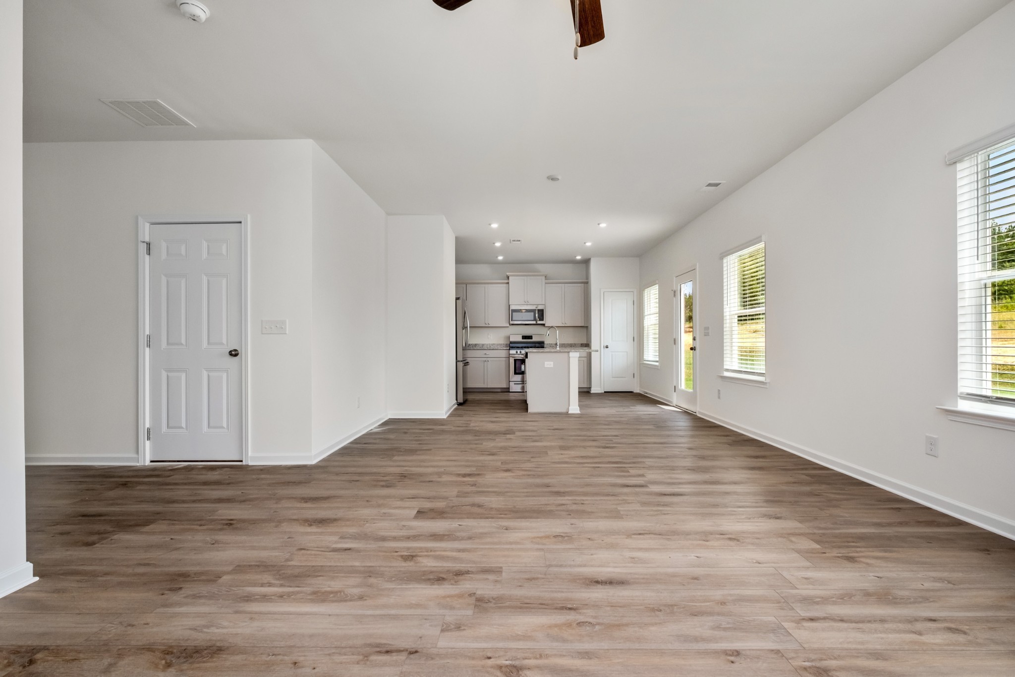 106 Keystone Road Shelbyville, TN 37160 - Photo 16 of 33 a view of empty room with wooden floor and windows