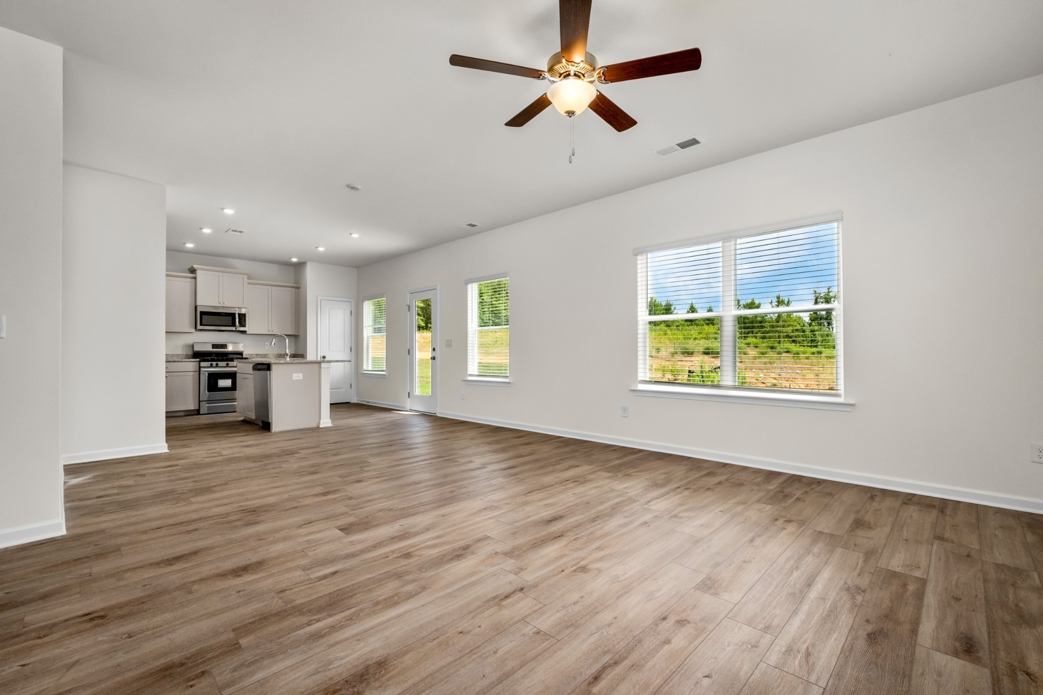 106 Keystone Road Shelbyville, TN 37160 - Photo 17 of 33 a view of an empty room with window and wooden floor