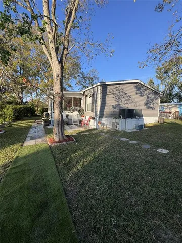 a view of lake with green space