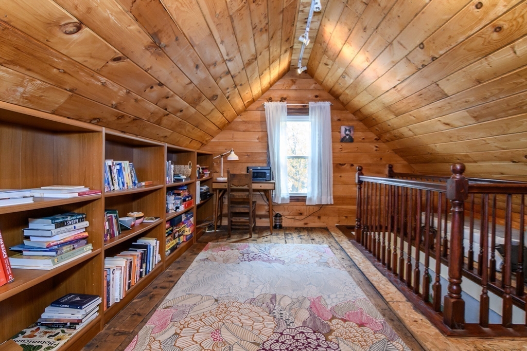 16 Alexander Street Framingham, MA 01702 - Photo 25 of 35 a area with lots of books