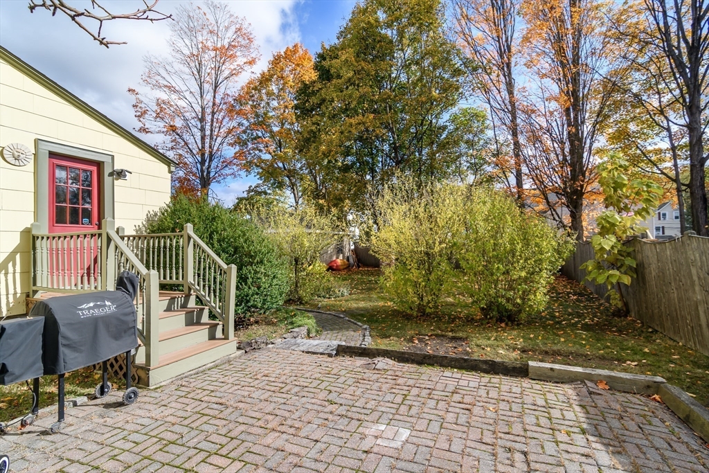 16 Alexander Street Framingham, MA 01702 - Photo 31 of 35 a view of a bench in the backyard of the house