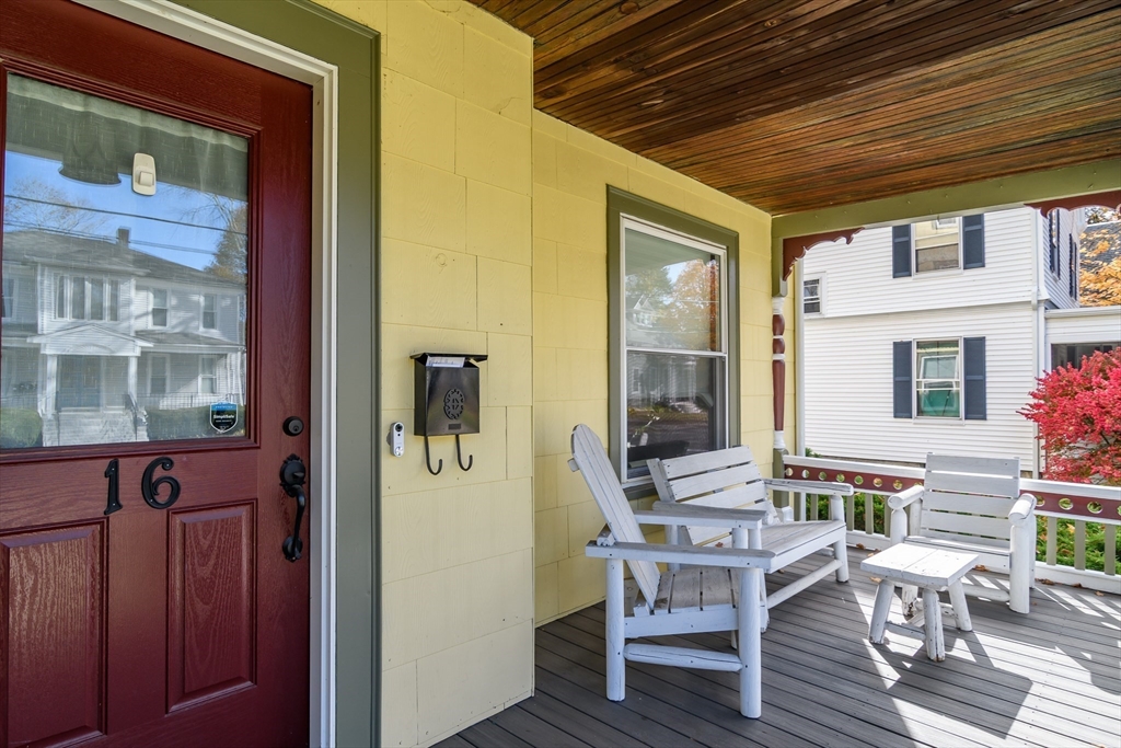 16 Alexander Street Framingham, MA 01702 - Photo 5 of 35 a balcony view with a dining table and chairs