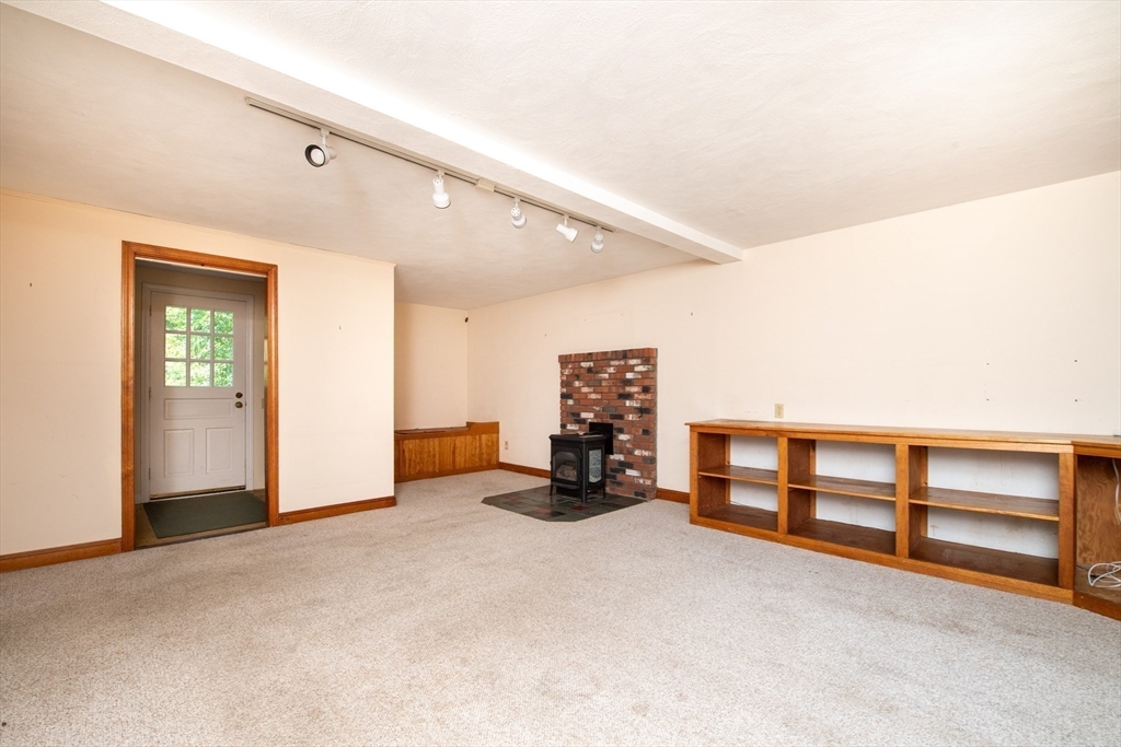 24 Ichabod Lane Marion, MA 02738 - Photo 14 of 35 a view of an empty room with a window