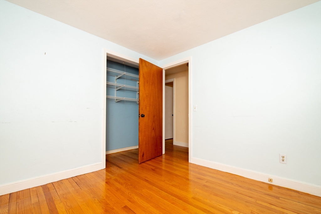 24 Ichabod Lane Marion, MA 02738 - Photo 26 of 35 a view of an empty room with wooden floor