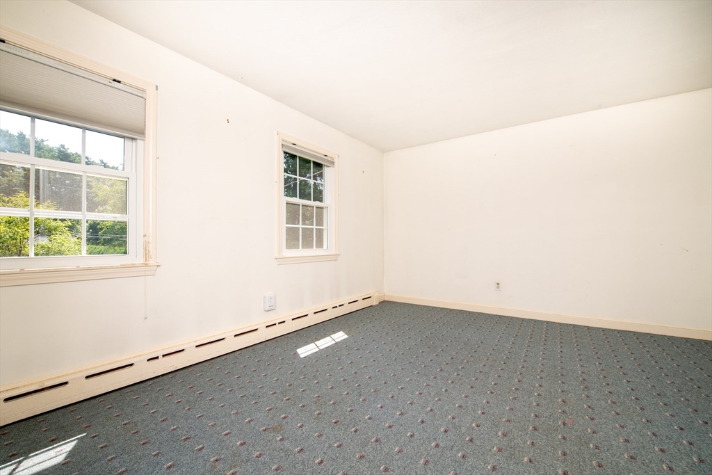 24 Ichabod Lane Marion, MA 02738 - Photo 28 of 35 an empty room with a window