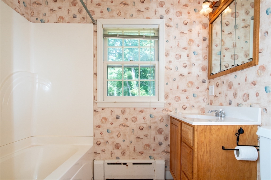24 Ichabod Lane Marion, MA 02738 - Photo 30 of 35 a bathroom with a bathtub and shower