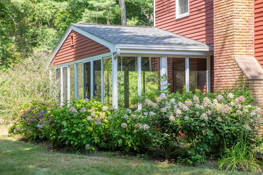 24 Ichabod Lane Marion, MA 02738 - Photo 3 of 35 a view of a house with potted plants