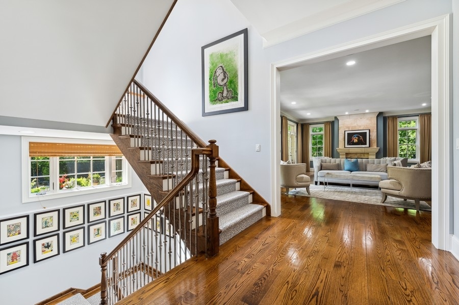 812 Hibbard Road Winnetka, IL 60093 - Photo 20 of 46 a living room with furniture and a wooden floor