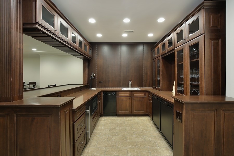 812 Hibbard Road Winnetka, IL 60093 - Photo 35 of 46 a kitchen with stainless steel appliances granite countertop a sink and stove top oven