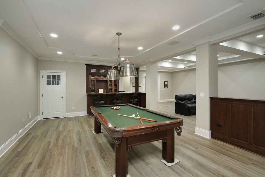 812 Hibbard Road Winnetka, IL 60093 - Photo 36 of 46 a room with wooden floor pool table and chairs