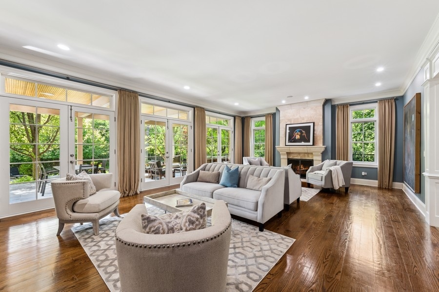 812 Hibbard Road Winnetka, IL 60093 - Photo 5 of 46 a living room with furniture and a large window