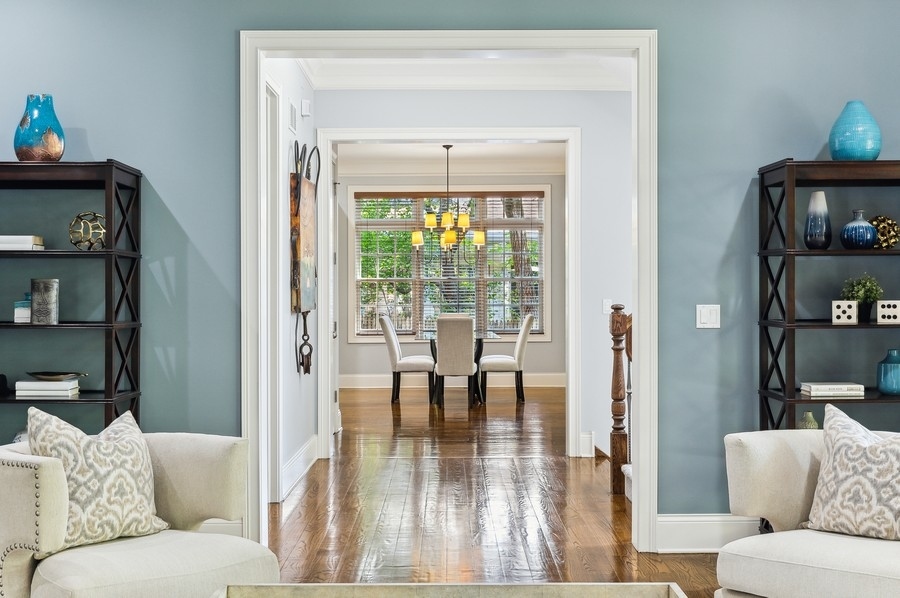 812 Hibbard Road Winnetka, IL 60093 - Photo 6 of 46 a living room with furniture and a floor to ceiling window
