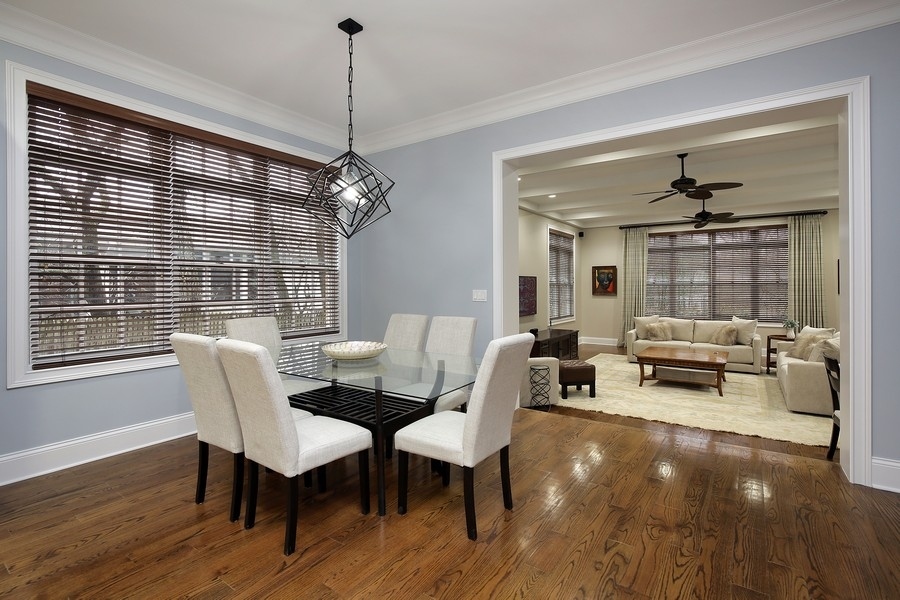 812 Hibbard Road Winnetka, IL 60093 - Photo 10 of 46 a living room with furniture and a chandelier