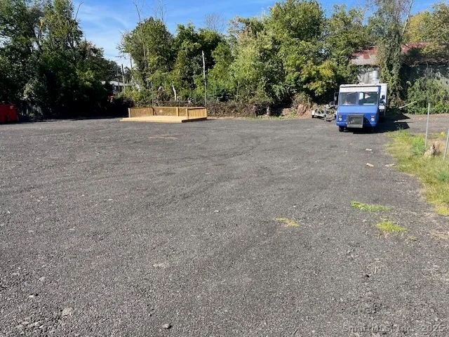 a view of a truck parked in a field