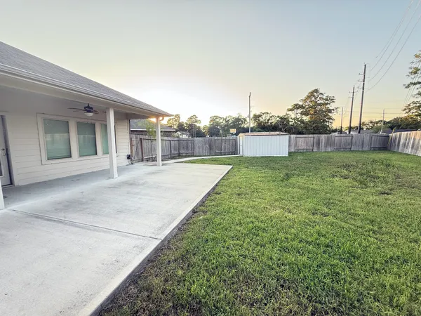 a swimming pool with a yard