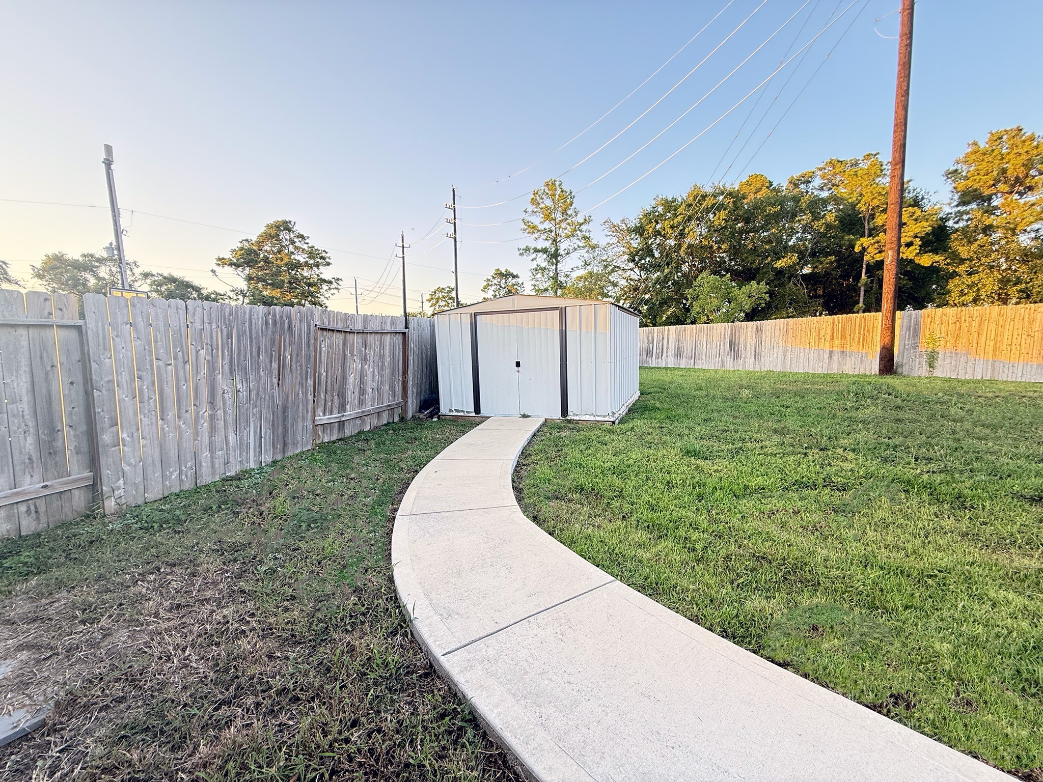 23726 Harrow Field Ln Spring Spring, TX 77373 - Photo 15 of 16 a view of a backyard