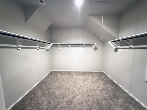 a view of a room with racks on the wall