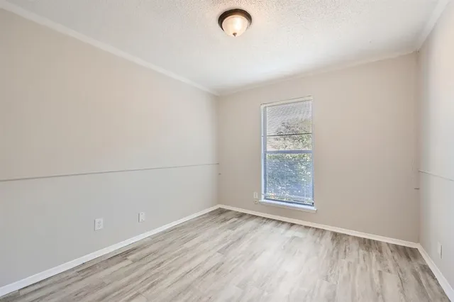 a view of small space with wooden floor