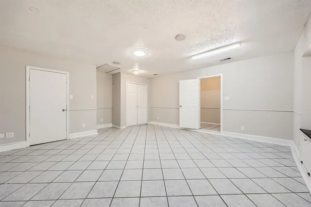 a bathroom with a toilet sink and vanity