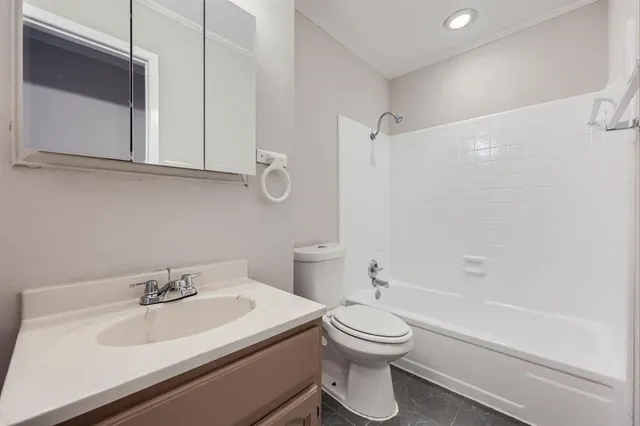 a view of a house with backyard