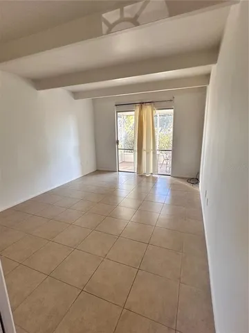 a view of an empty room and window