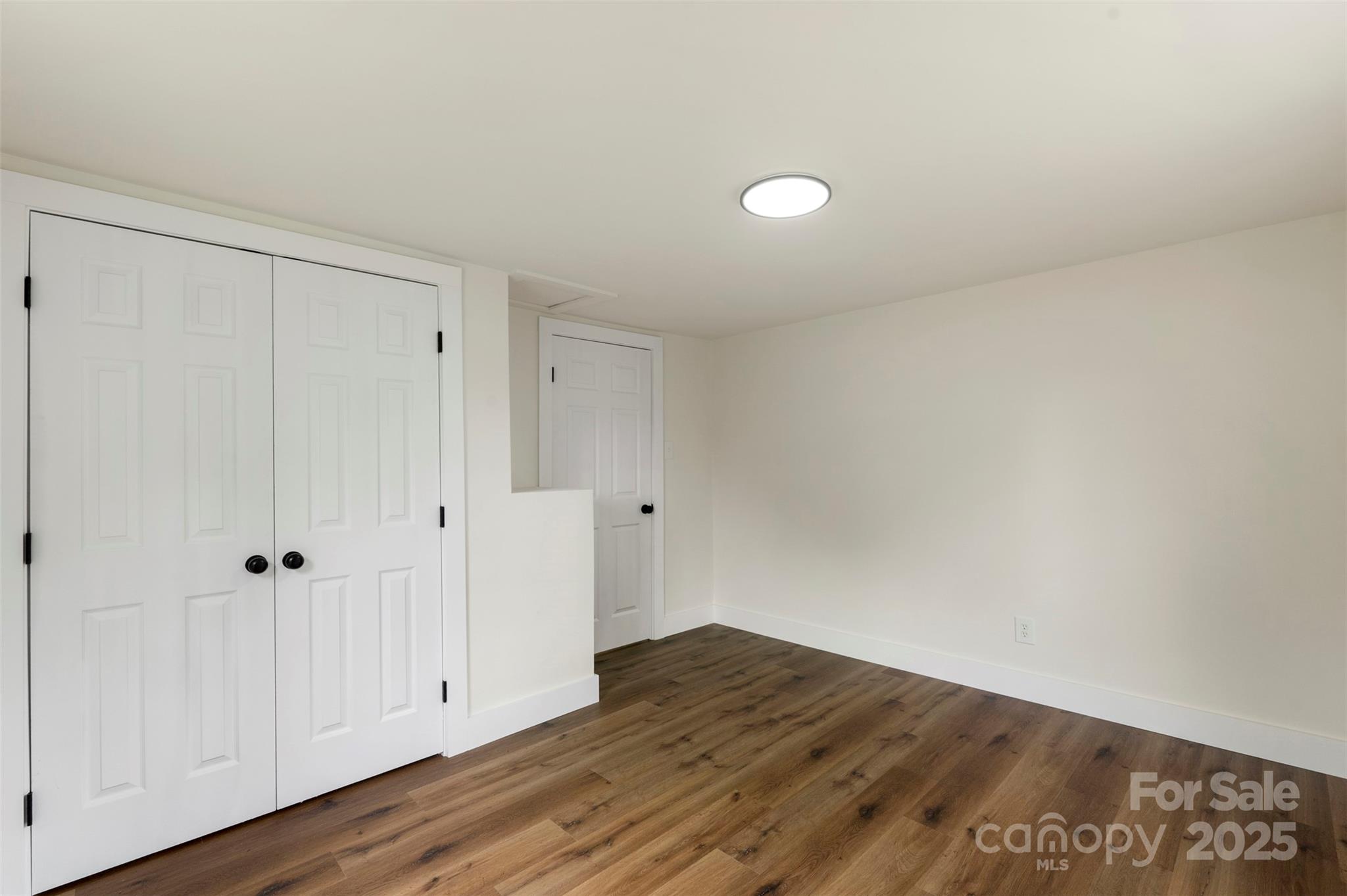 3114 Taxahaw Road Lancaster, SC 29720 - Photo 25 of 41 a view of an empty room and wooden floor