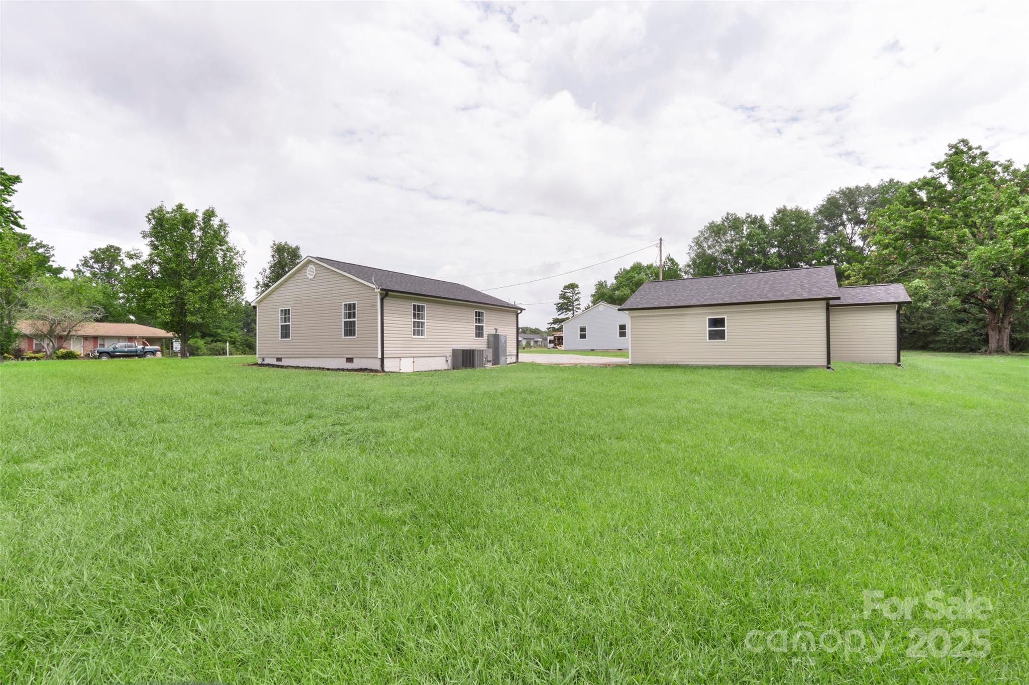 3114 Taxahaw Road Lancaster, SC 29720 - Photo 3 of 41 a house view with a garden space