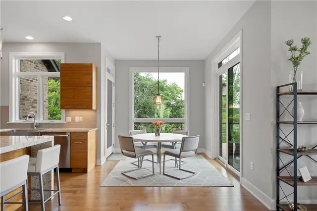 a work room with furniture and a window