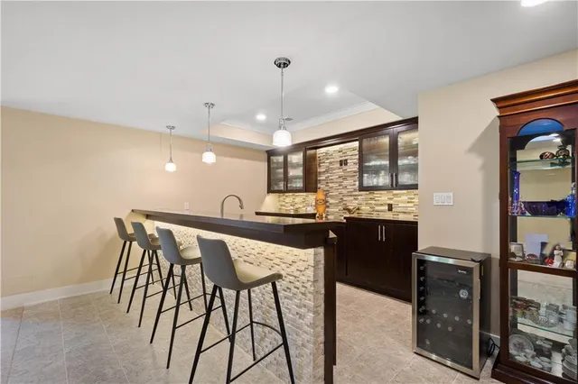 a kitchen with a table and chairs in it