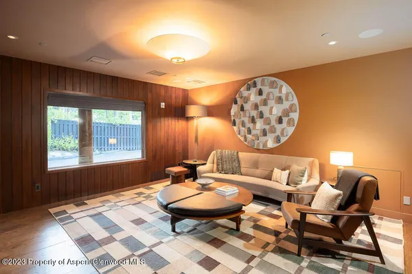 a bedroom with a bed and the view of en suite bathroom