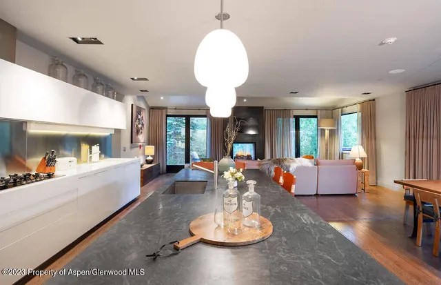 a bedroom with a large bed and a large window