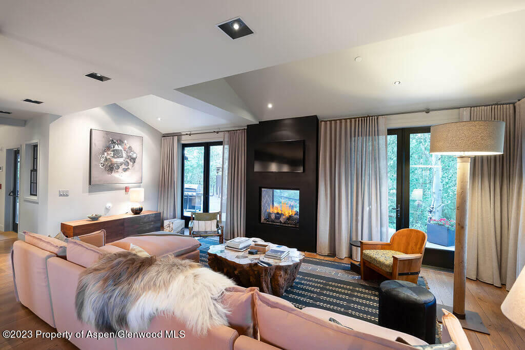 1490 Ute Avenue Aspen, CO 81611 - Photo 42 of 82 a living room with furniture and a large window