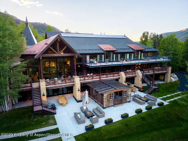 a living room with furniture and a projector