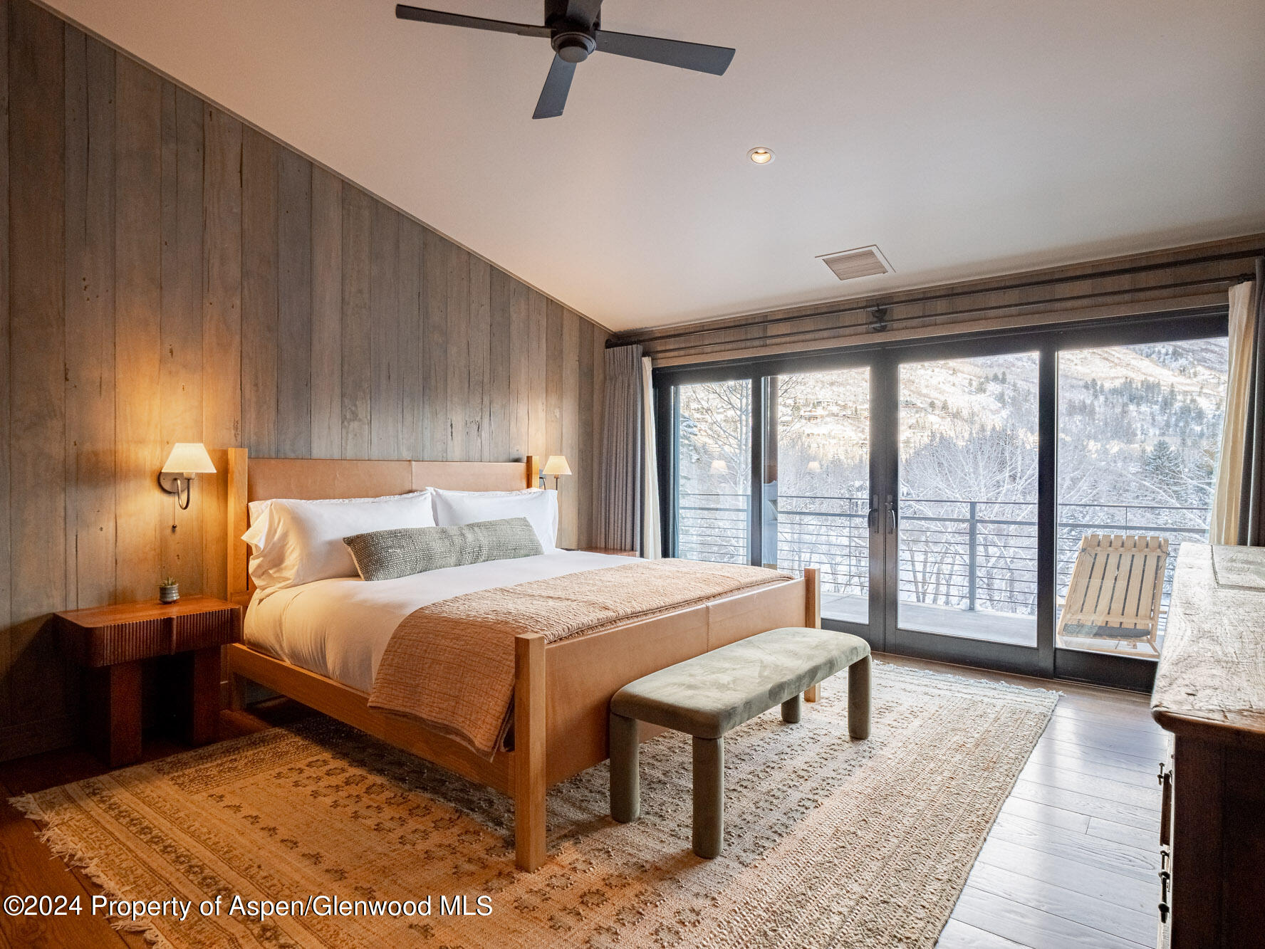 1490 Ute Avenue Aspen, CO 81611 - Photo 63 of 82 a bedroom with a large bed and a large window