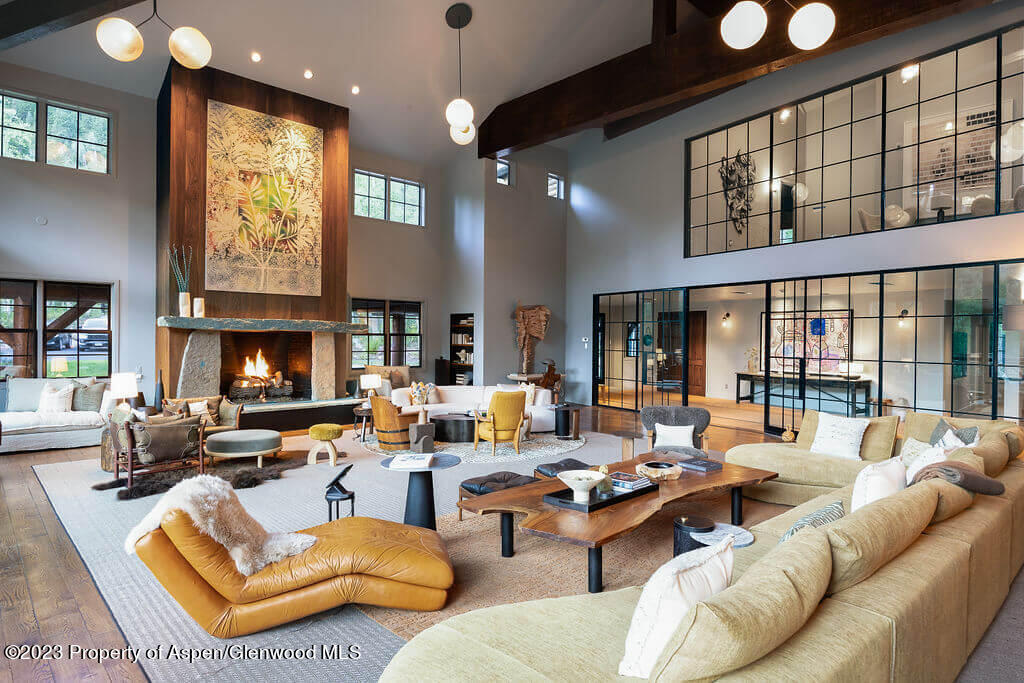 1490 Ute Avenue Aspen, CO 81611 - Photo 7 of 82 a living room with fireplace furniture and a large window