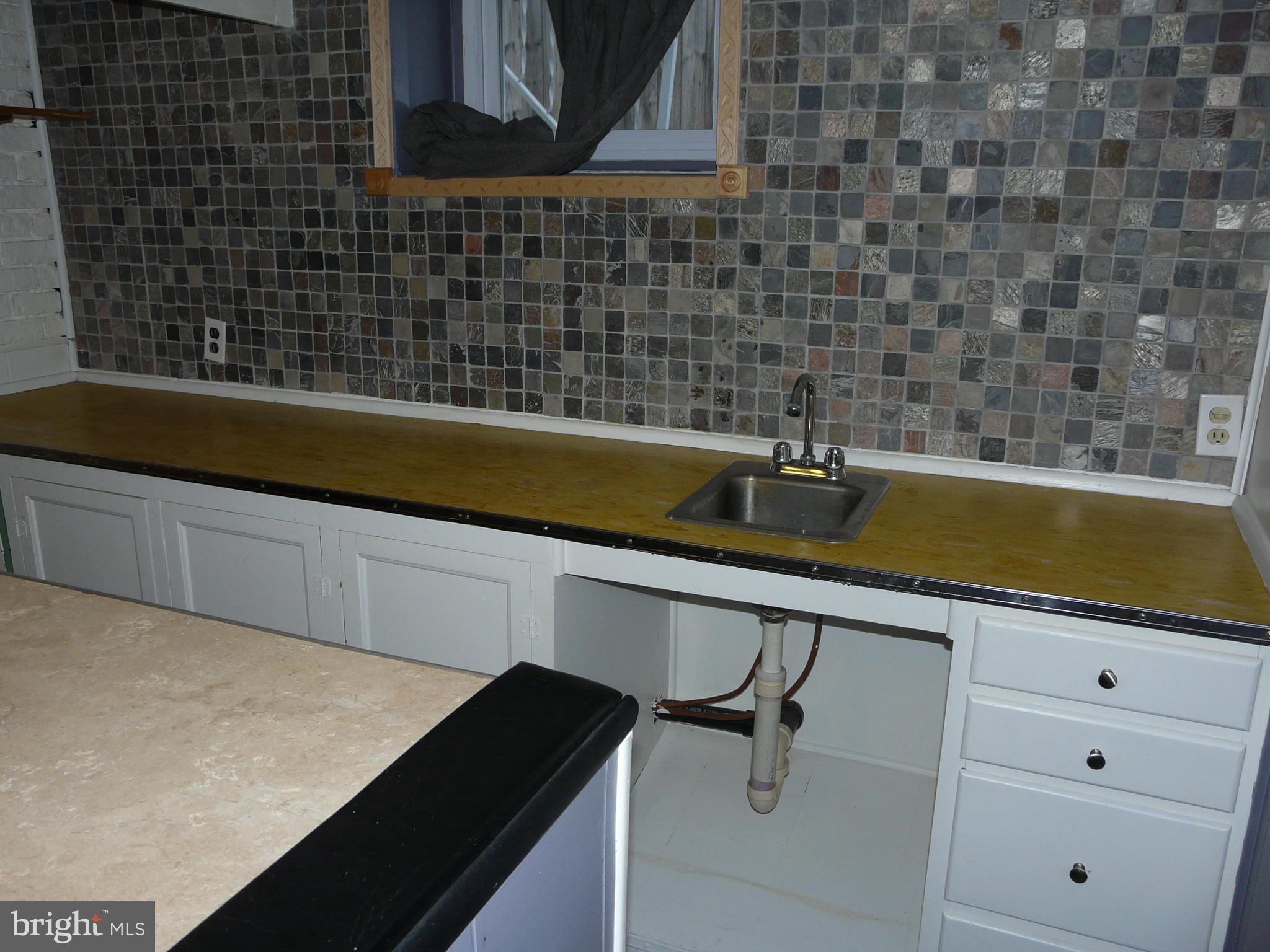 5911 Meadow Road Baltimore, MD 21206 - Photo 28 of 49 Lower Level Wet Bar