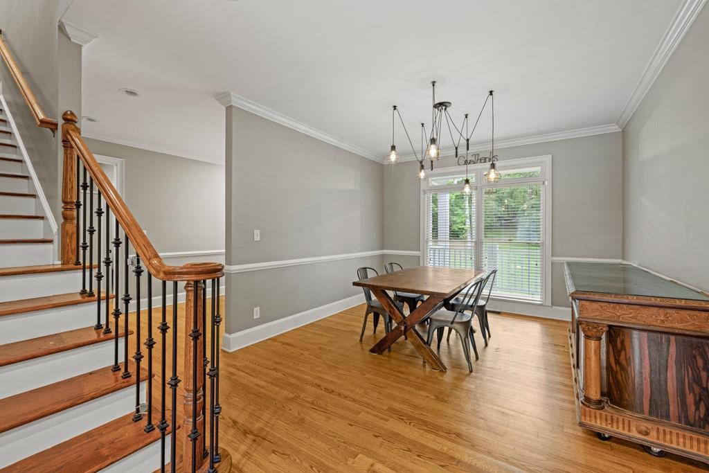 2230 Ewing Chapel Road Dacula, GA 30019 - Photo 11 of 54 a view of a dining room with furniture window and wooden floor