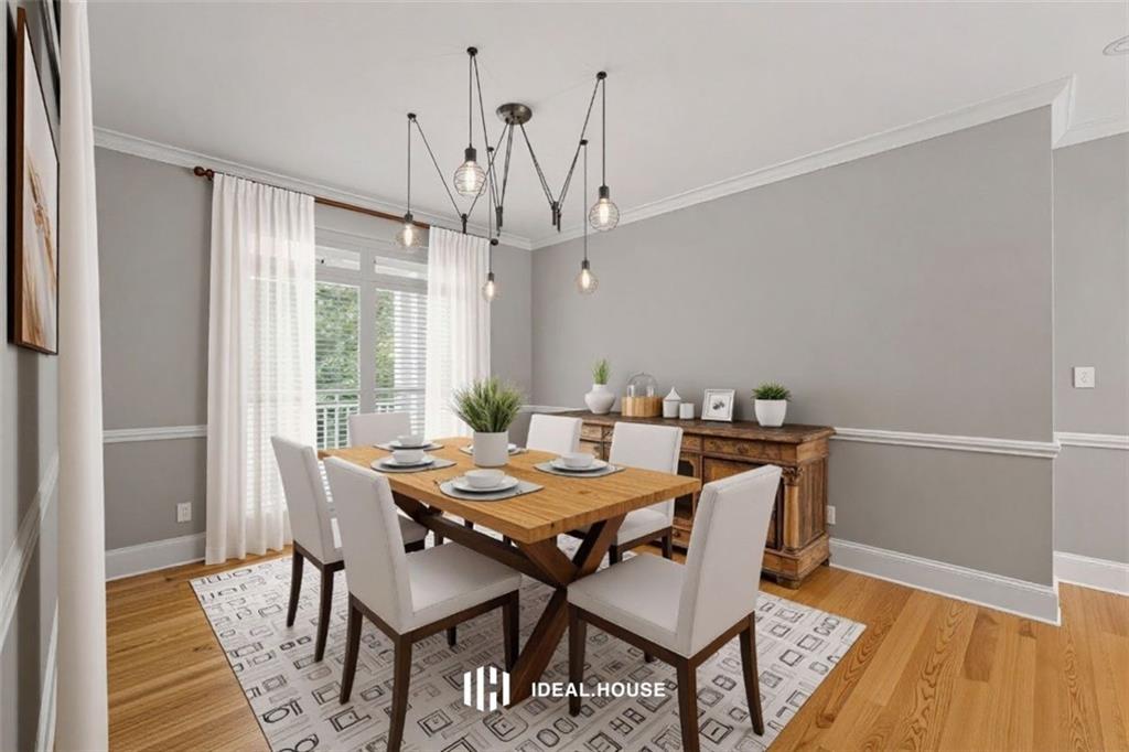 2230 Ewing Chapel Road Dacula, GA 30019 - Photo 12 of 54 a view of a dining room with furniture window and wooden floor