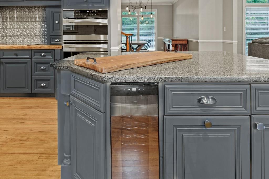 2230 Ewing Chapel Road Dacula, GA 30019 - Photo 14 of 54 a kitchen with a stove and a refrigerator